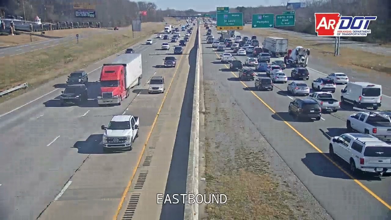 Arkansas: Dump Truck Drags Car Down Road 