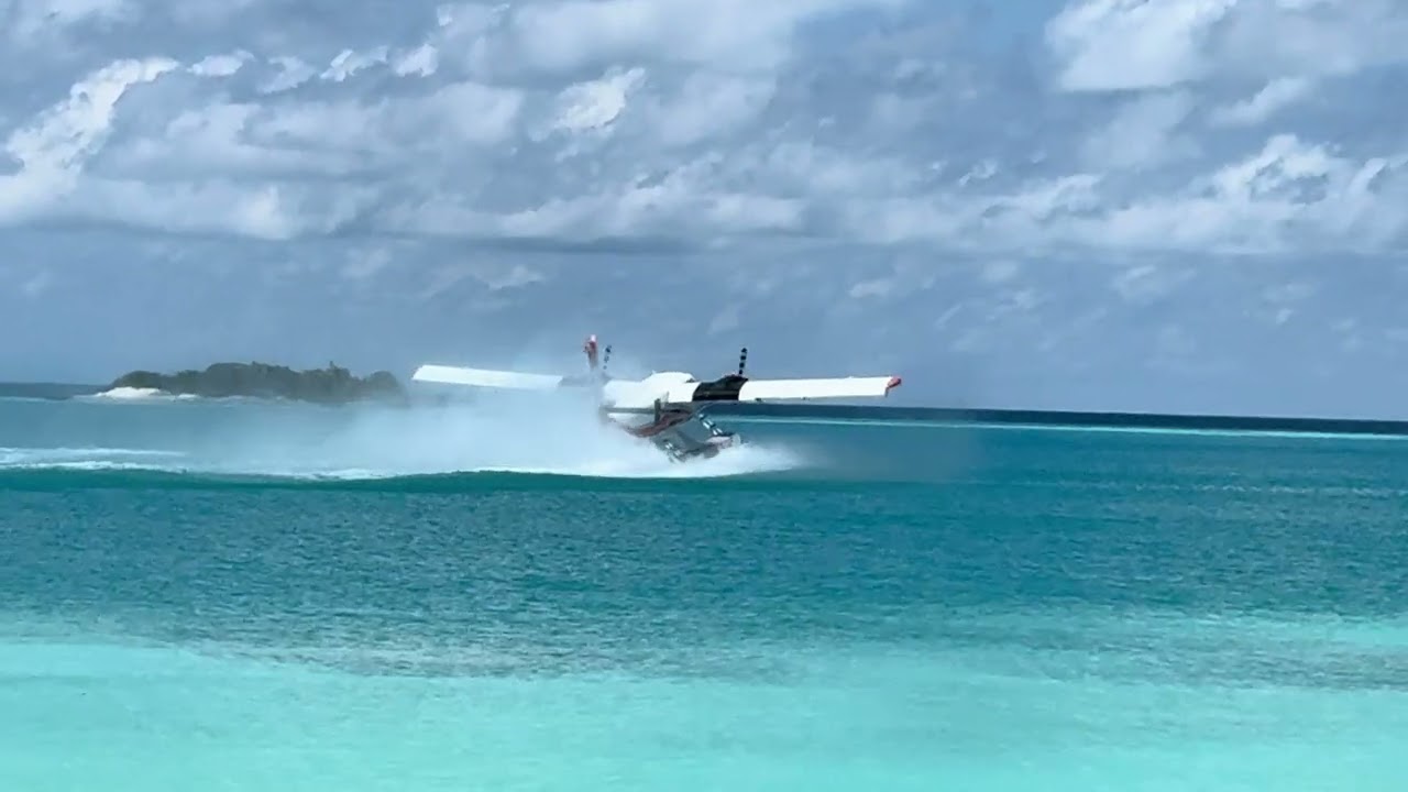 Trans Maldivian Twin Otter taking off from Ananea