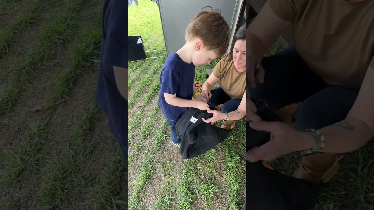 So easy a 6 year old can do it! Air vest trigger reset.