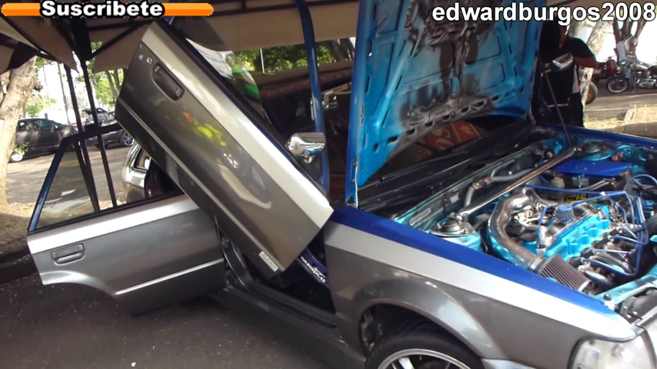 mazda 323 Tuning modificado car audio puertas verticales rines de lujo pantallas autos 2012 FULL HD