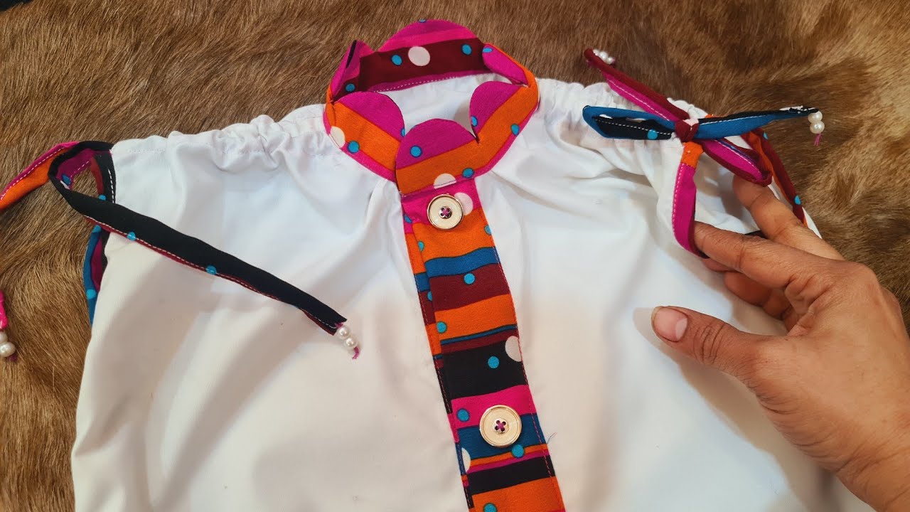 Beautiful baby top frock cutting and stitching//how to make perfect ban collar for baby 