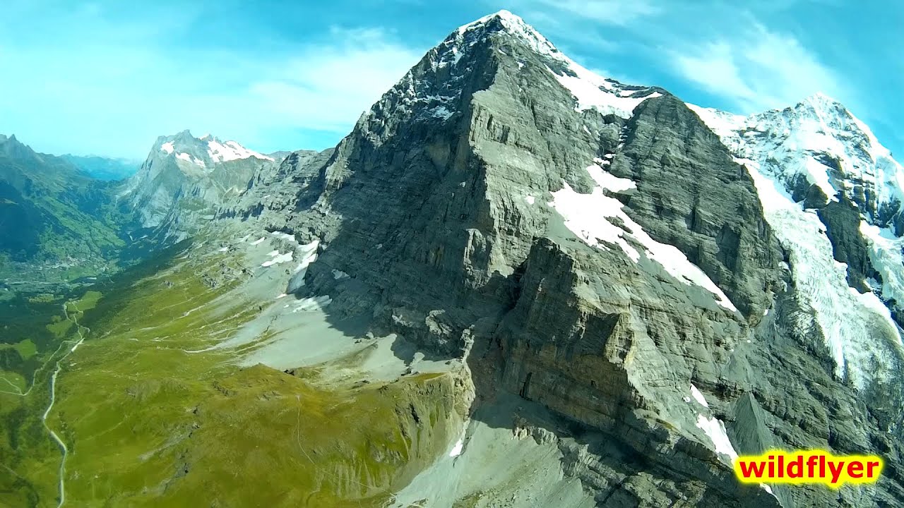 Swiss Eiger Northface view from very small quadcopter flying high and fast!