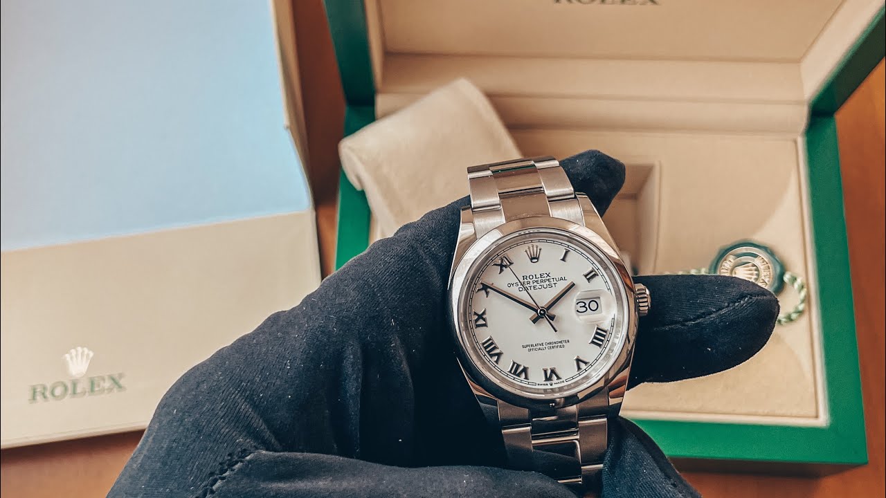 New Rolex Datejust 126200 white roman dial full set 2021