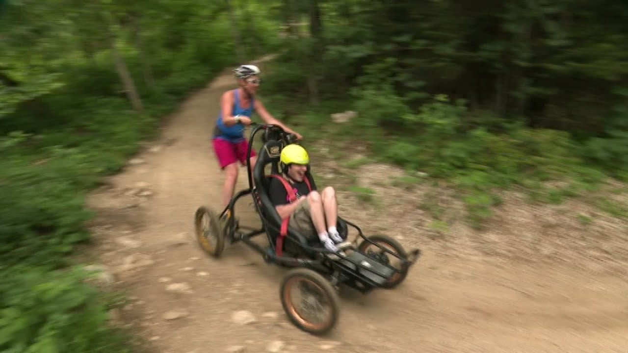 Page été : descente en fauteuil tout terrain CIMGO des pentes de Métabief