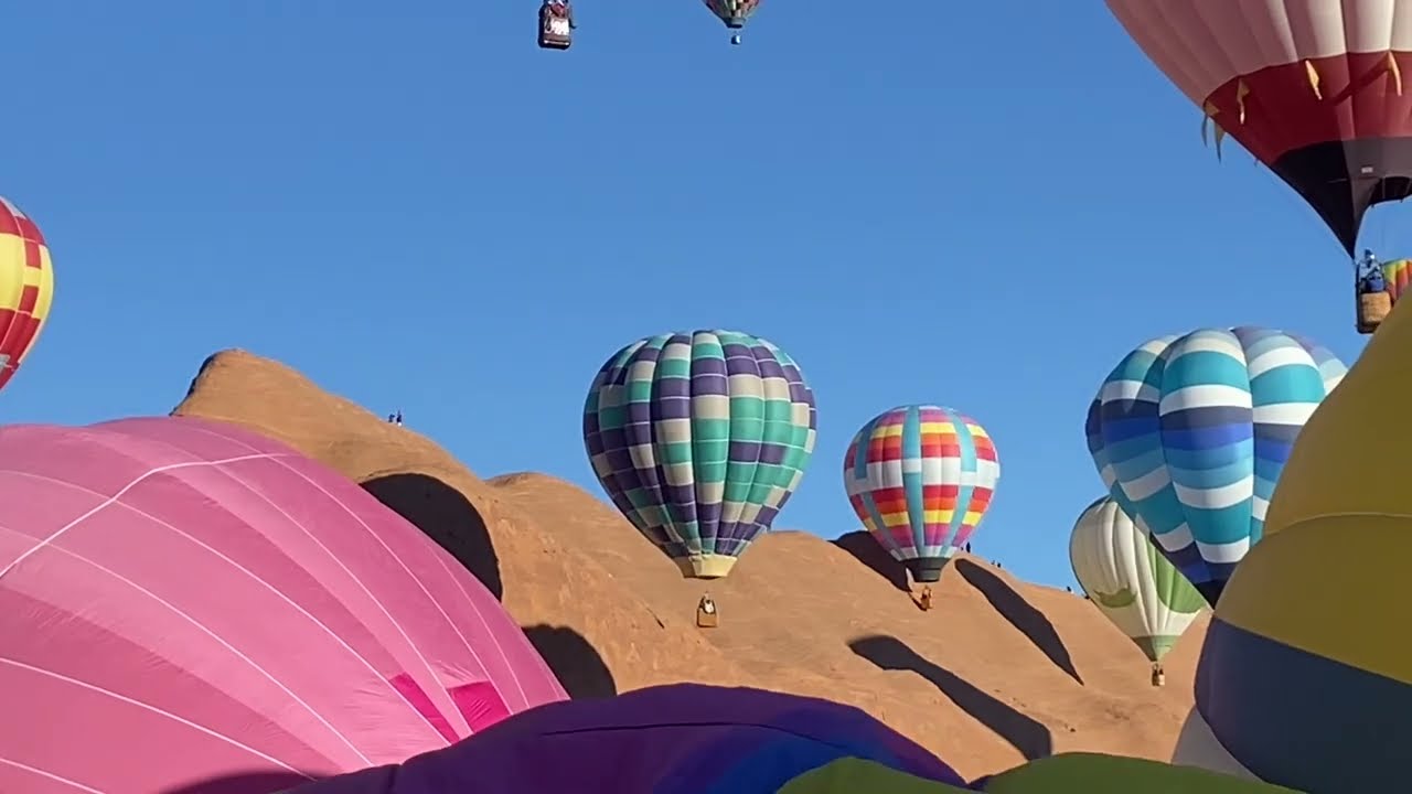 Group of hot air balloons at the red rocks