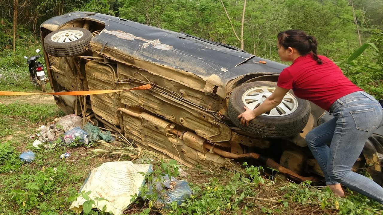 The girl who pick up old car from junkyard to repair and restore. Replace starter, engine oil