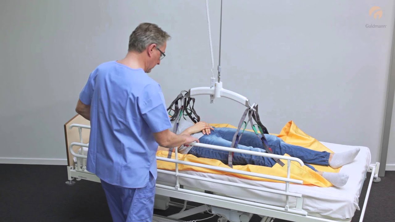 Guldmann Sling Instruction: Repositioning sling - Moving patient in bed