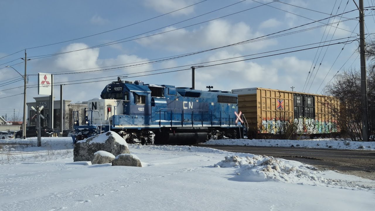 CN Engine 4907 crosses Eagle St. N. in  Cambridge, ON on the Fergus Sub.