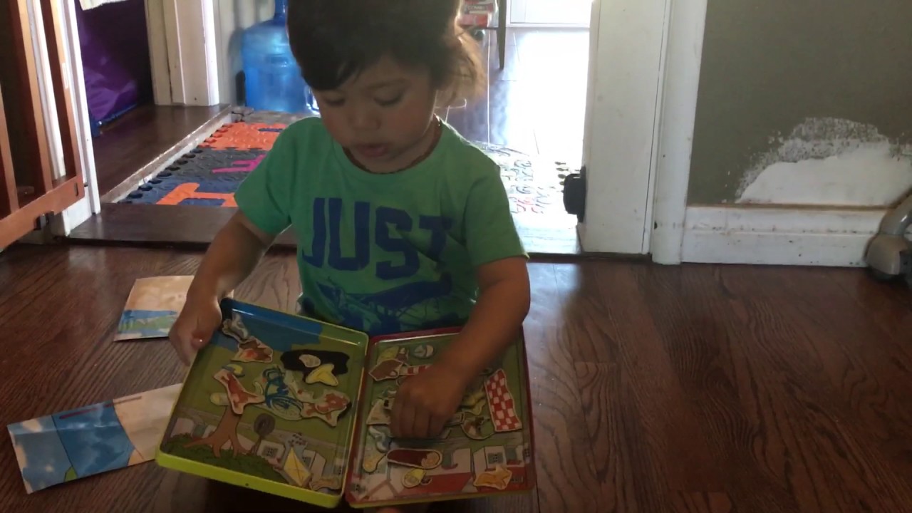 3/8/16 Playing with curious George Magnet