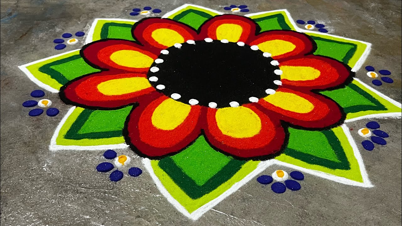 Unique and beautiful rangoli 🌈🌺🍀