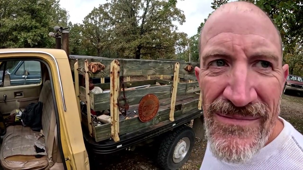 Having fun in an old factory GMC work truck