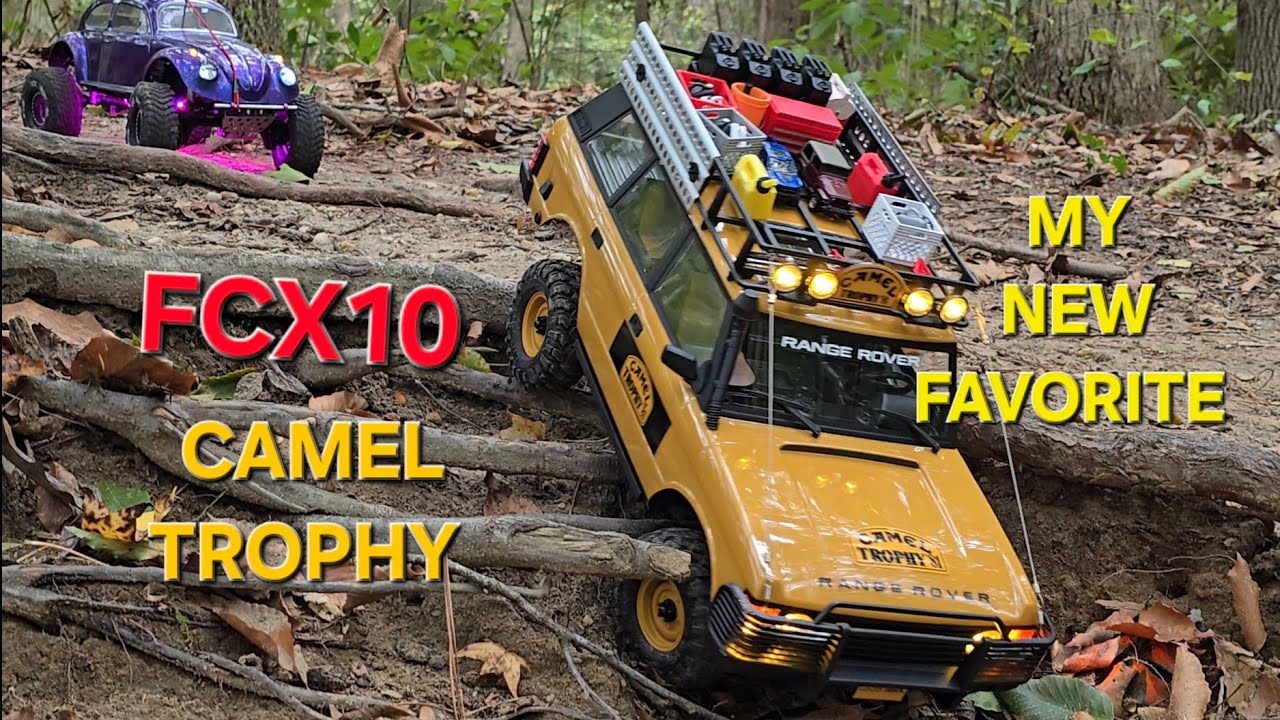 FMS FCX10 RANGE ROVER CAMEL TROPHY и TRX4 SLUG BUG. Соревнования проходят по скалам государственн...
