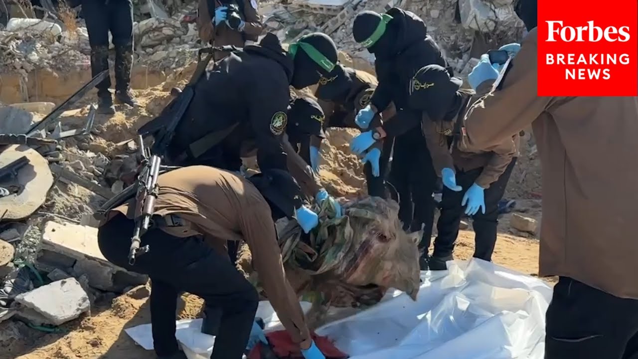 Armed Hamas Members Claim To Recover Remains Belonging To Deceased Hostage