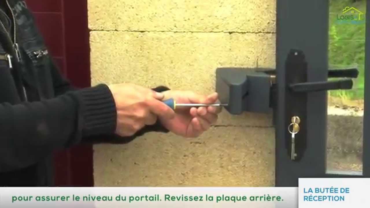 Installation portail coulissant, pose de la butée de réception, par Logis et Clôtures