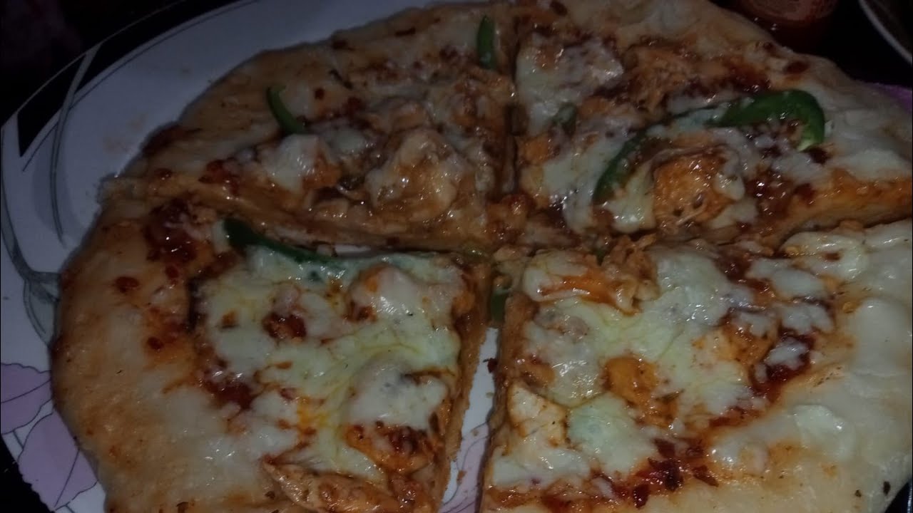 Chicken cheesy pizza make perfect and cheap. A slice above the rest . without oven