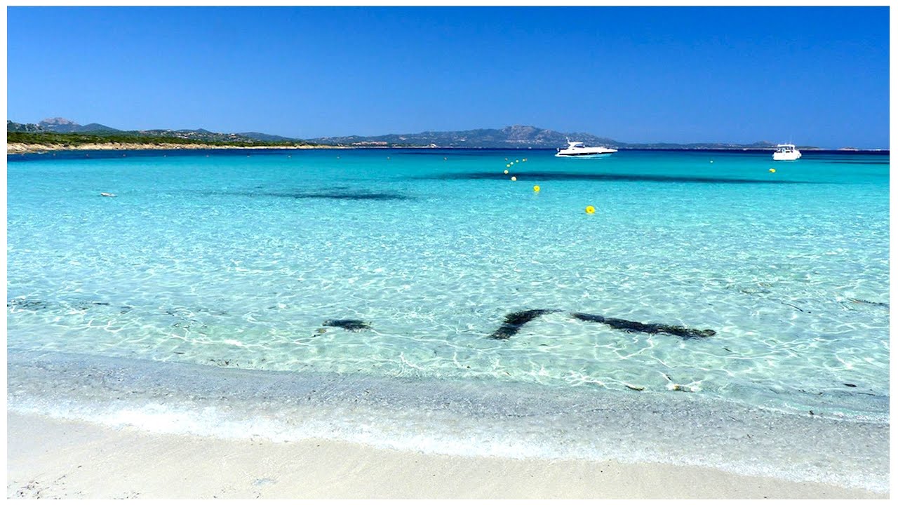 Spiaggia di Marinella e il suo mare color smeraldo Golfo Aranci  Sardegna 4k