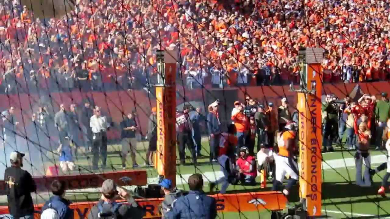 Denver Broncos AFC Championship Game Pregame - Broncos players running out of the tunnel