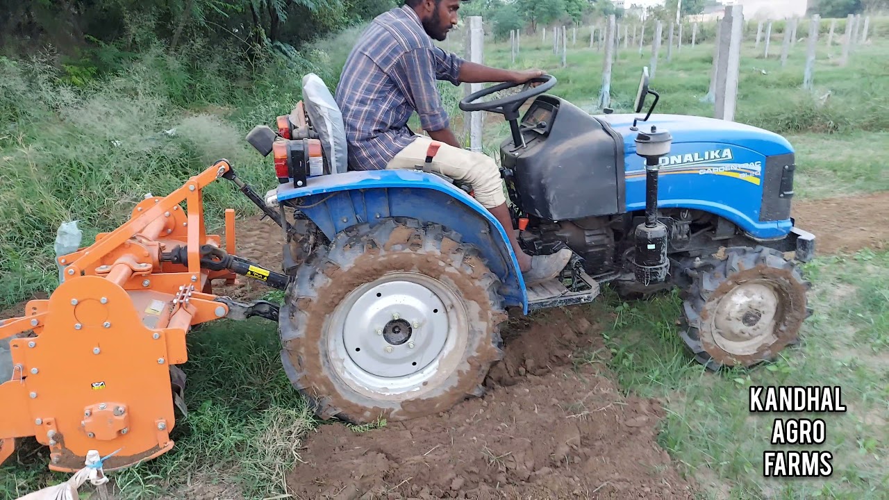 Sonalika 20 Hp GT Mini tractor 4x4 With 3.5 feet Smart Rotavator Series working