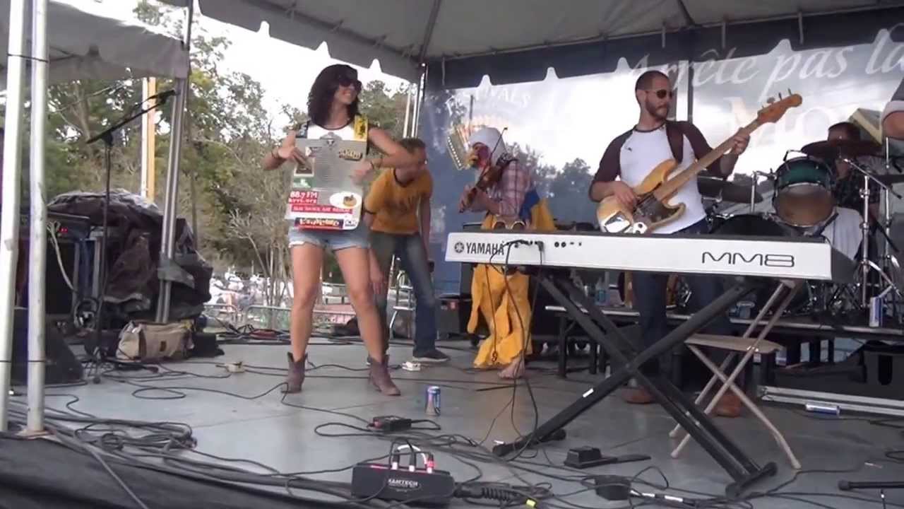 Pine Leaf Boys and a Camel at Festivals Acadiens