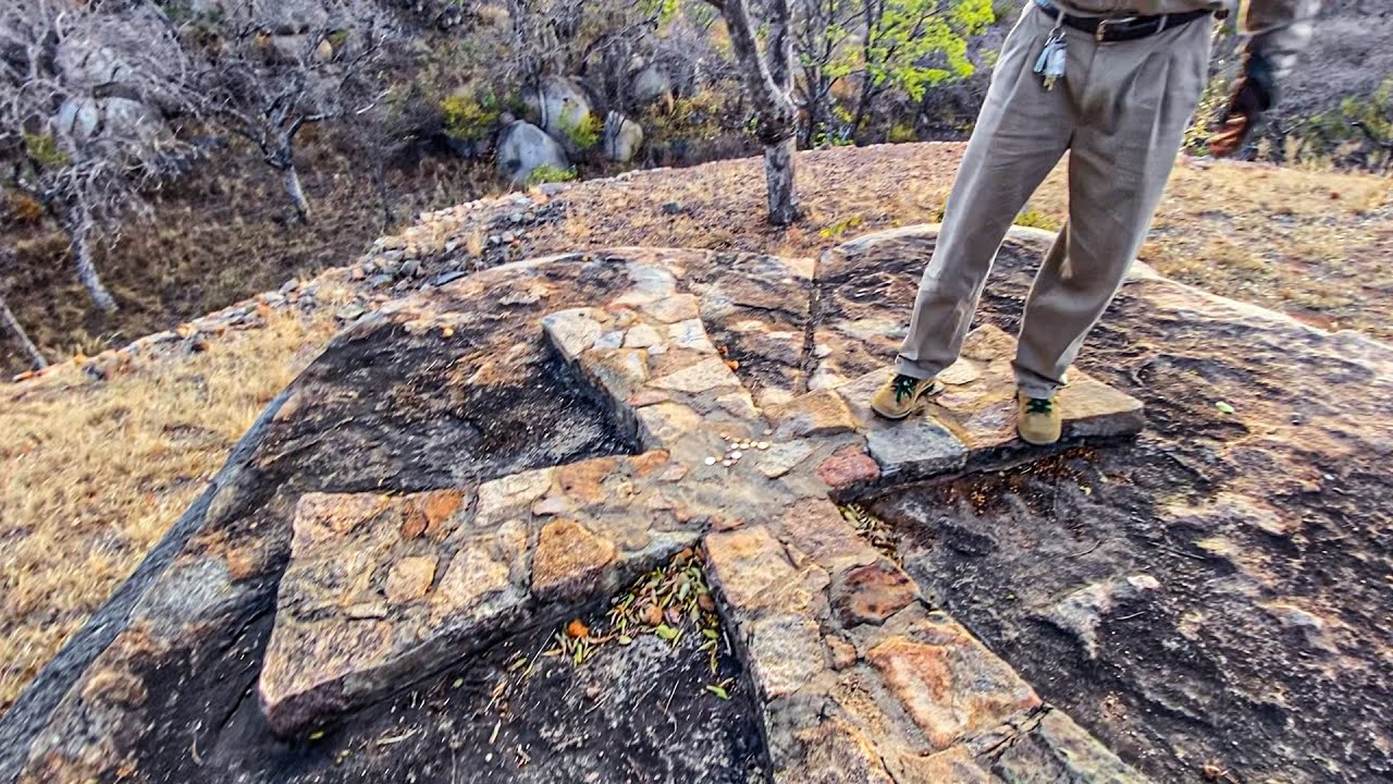 Why crosses are placed on Ancient Ancestral sacred land in Zimbabwe? Khami Ruins