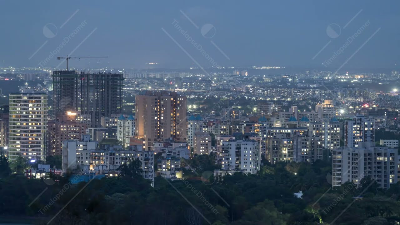 Day to Night Time lapse of City Skyline captured from a Hill, City of Pune, Maharashtra, India