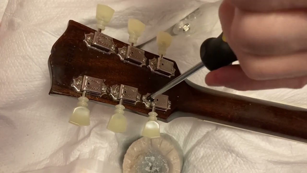 New Kluson, double line, double ring replacement tuning machines with 10mm adapter bushings.