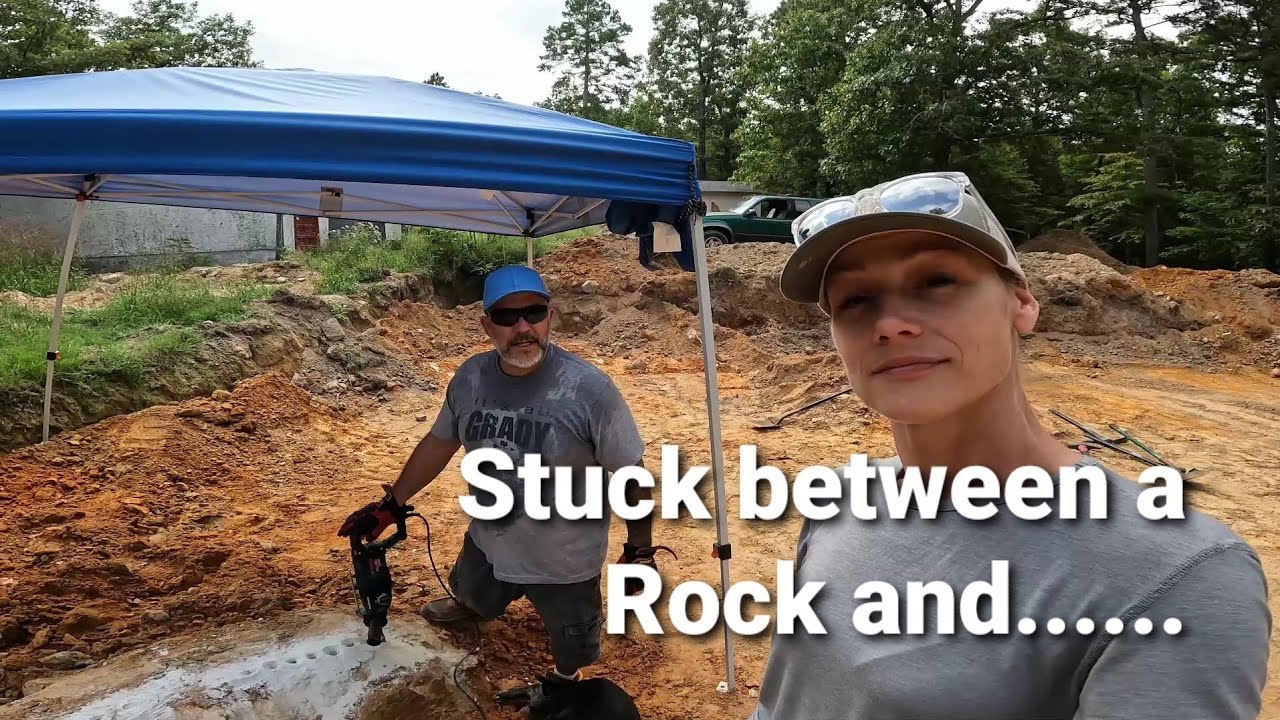 Couple Builds house /Walkout basement dig/Tractor issues /Removing huge sandstone rock