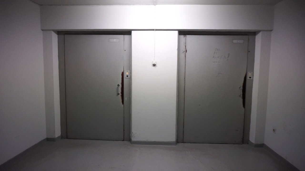 2x original 1965 KONE traction elevators without inner doors @ Haartmaninkatu 4, Helsinki, Finland