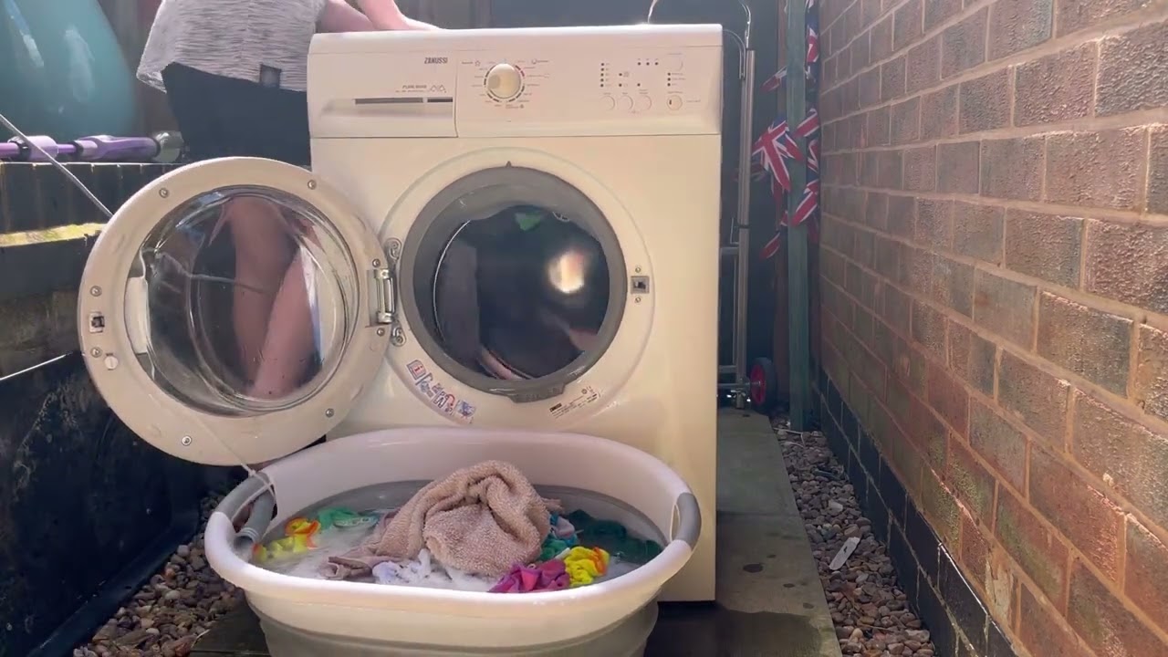 Zanussi washing machine vs wet towels and 5l bottle