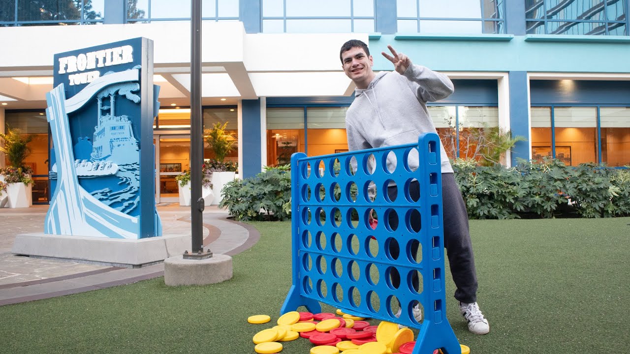 PLAYING CONNECT FOUR IN DOWN TOWN DISNEY