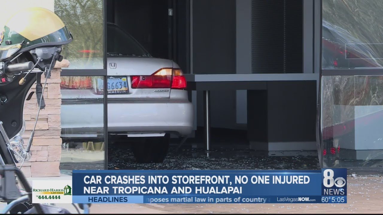 Car crashes into building, no one is injured