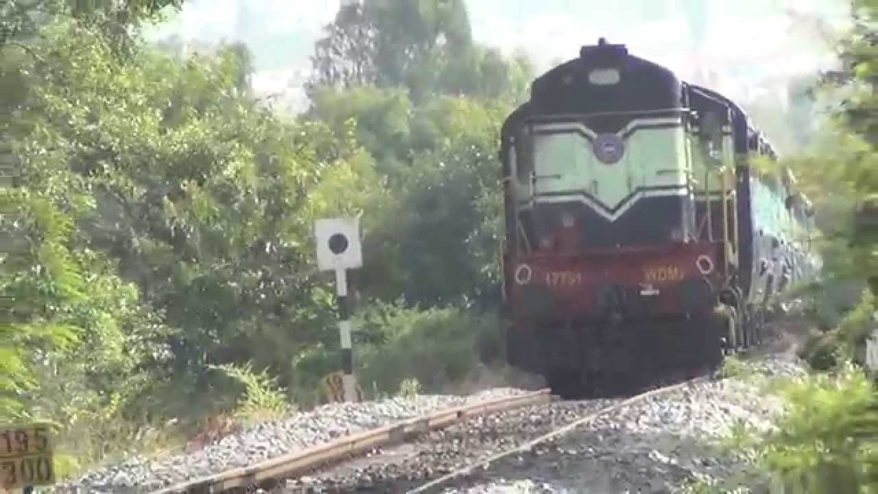 KJM WDM2 chugging and struggling hard over a gradient to pull KIK pass