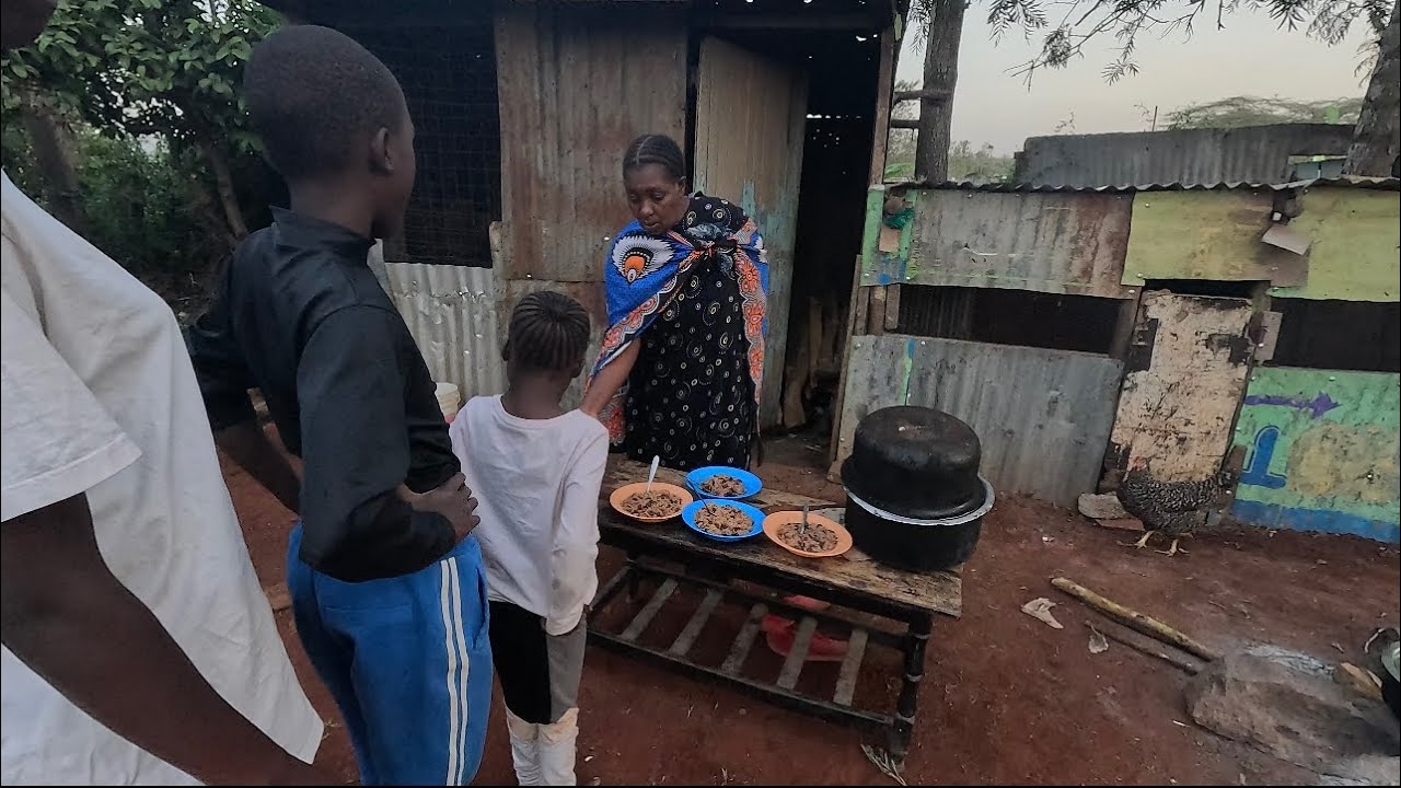Cooking Black Beans and Rice in an African village 