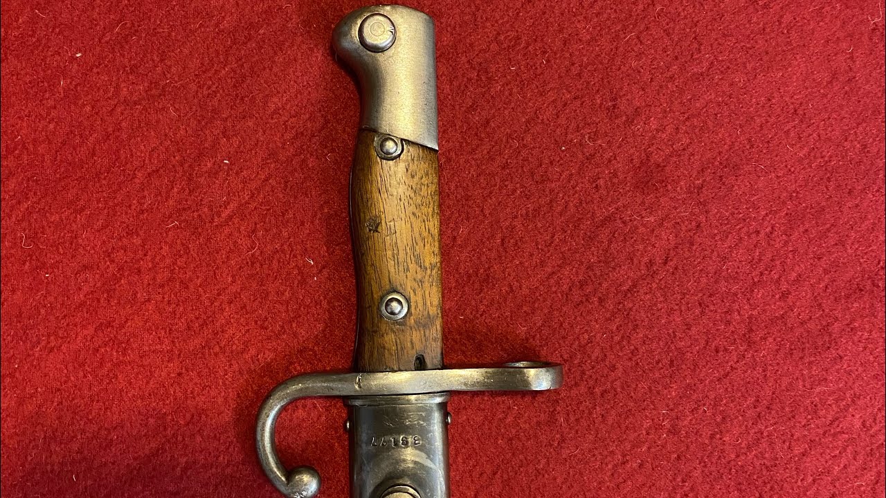 Ww1 Argentina bayonet model 1909 long blade , wooden handle .