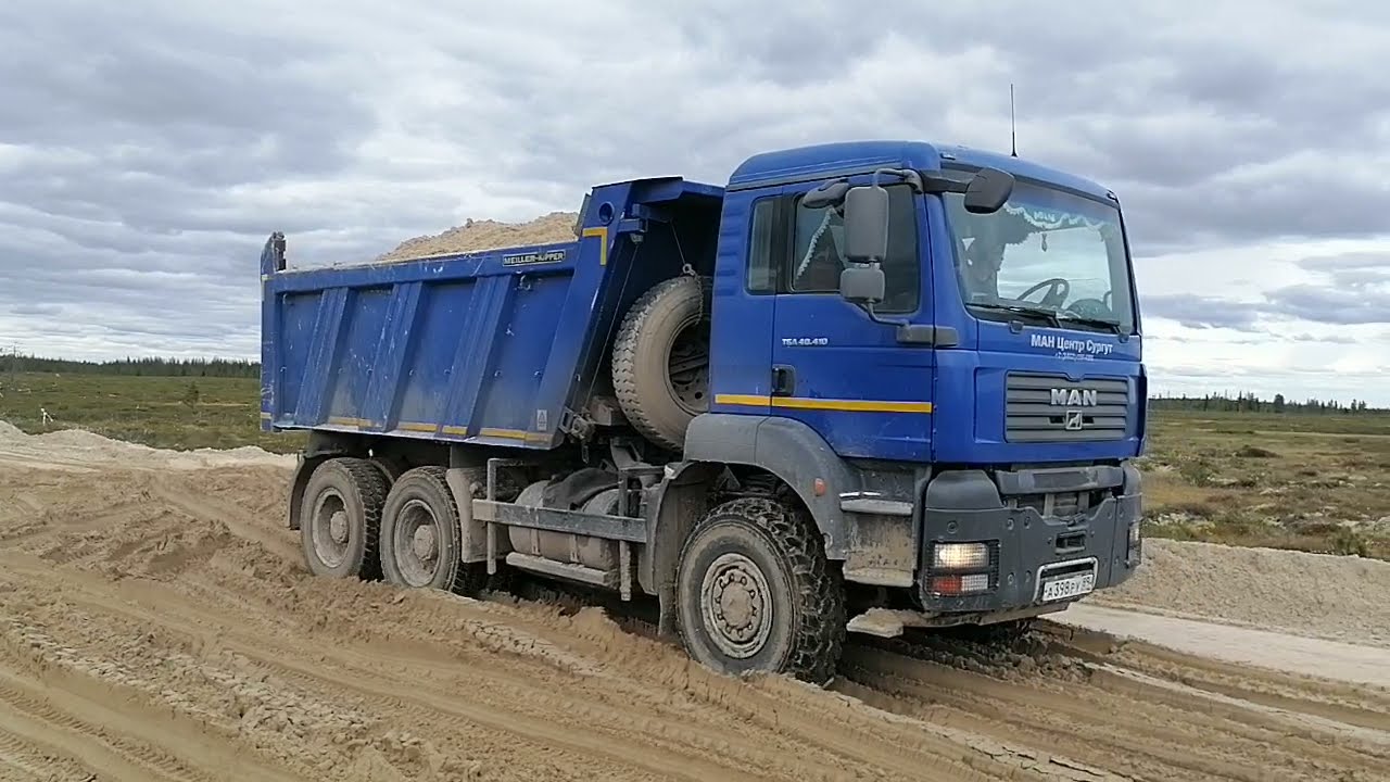 Север, новая отсыпка кустовой площадки, MAN TGA TGS SHANTUI SD23 XGM каток.