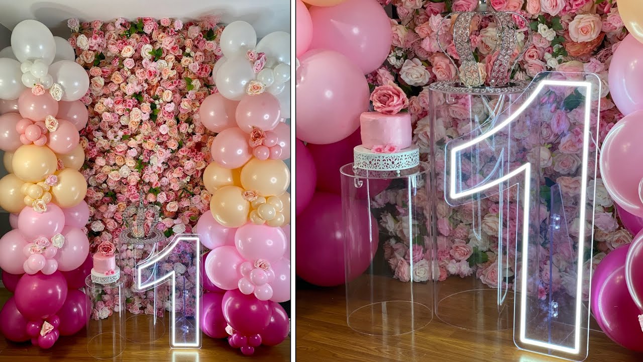 Balloon Columns With Pink Flower Wall