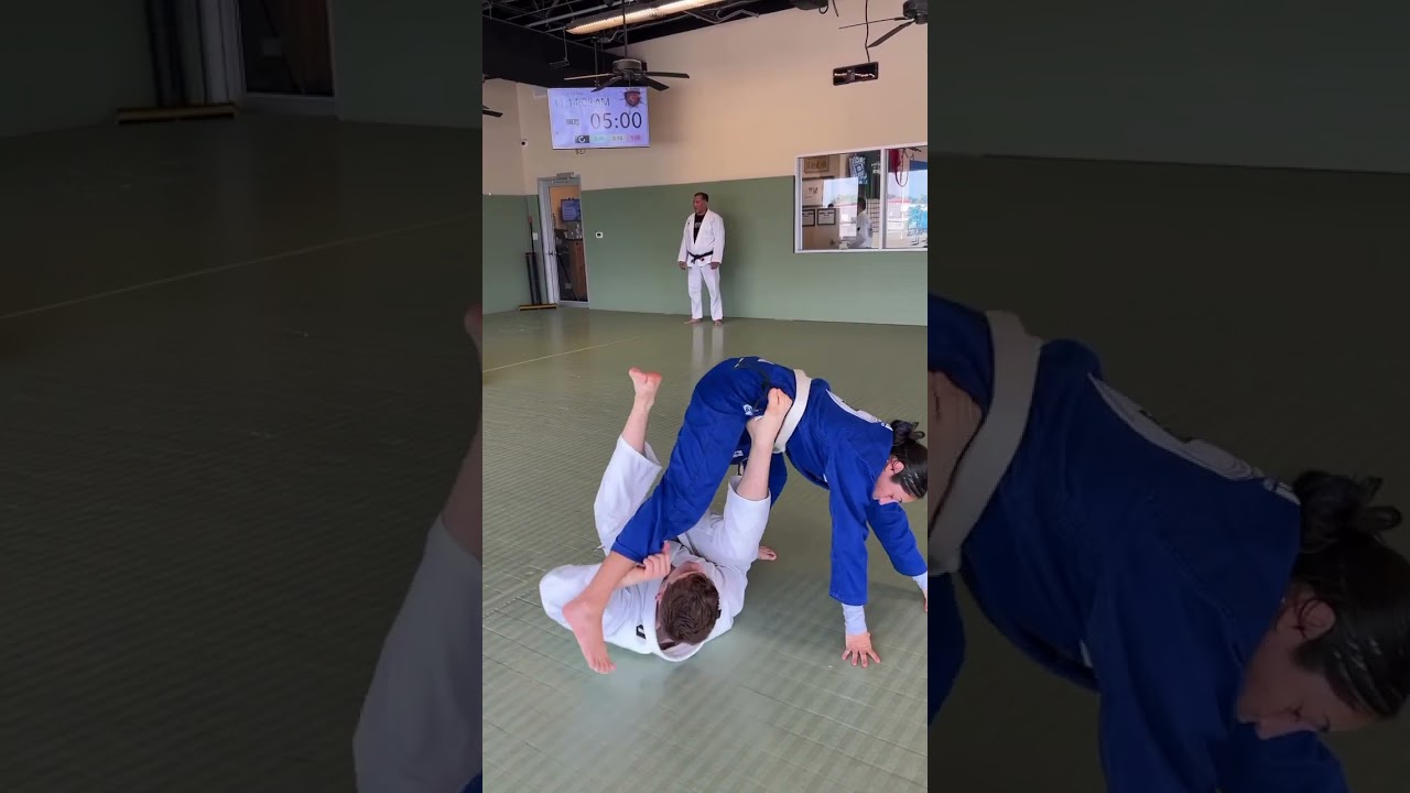 50/50 sweep from de la riva guard