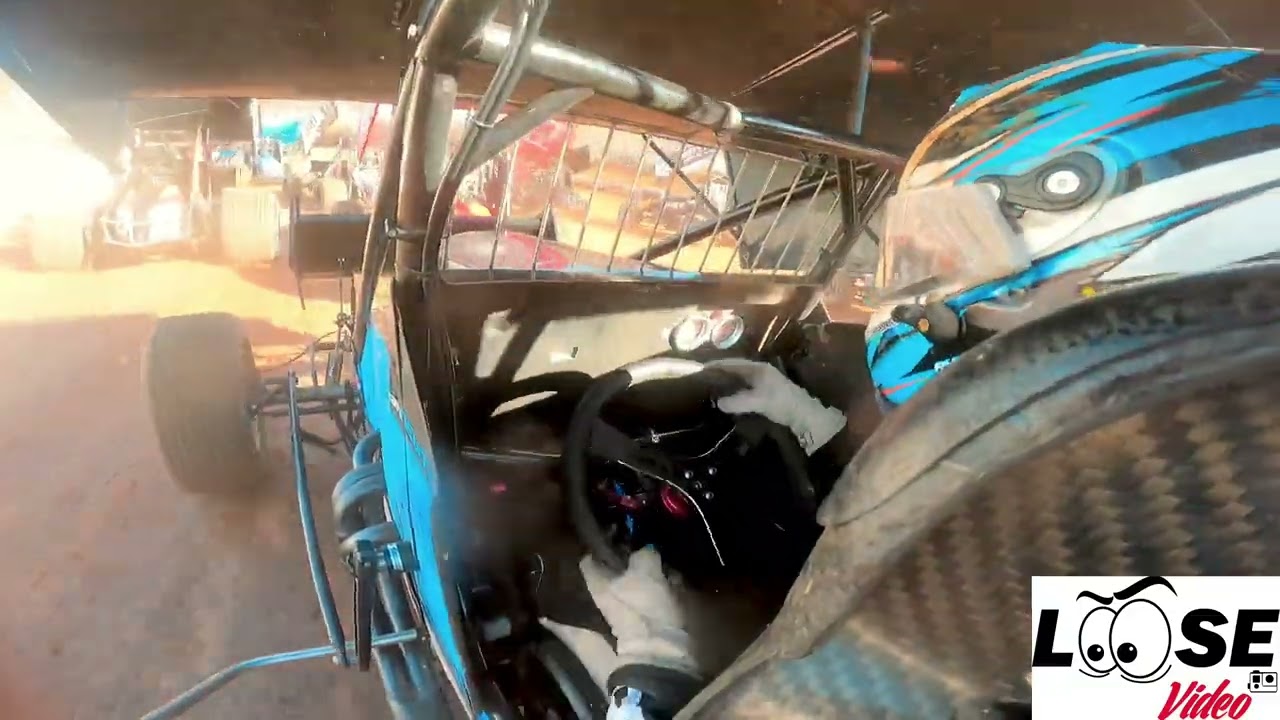 Ryan Newton goes for a tumble after getting in the slick on lap 1 of the 410 A at Lincoln 4-7-24