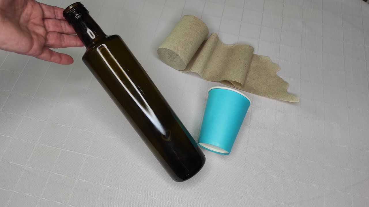 Made an amazing bottle decor. Fairy House tree from a bottle and toilet paper. DIY