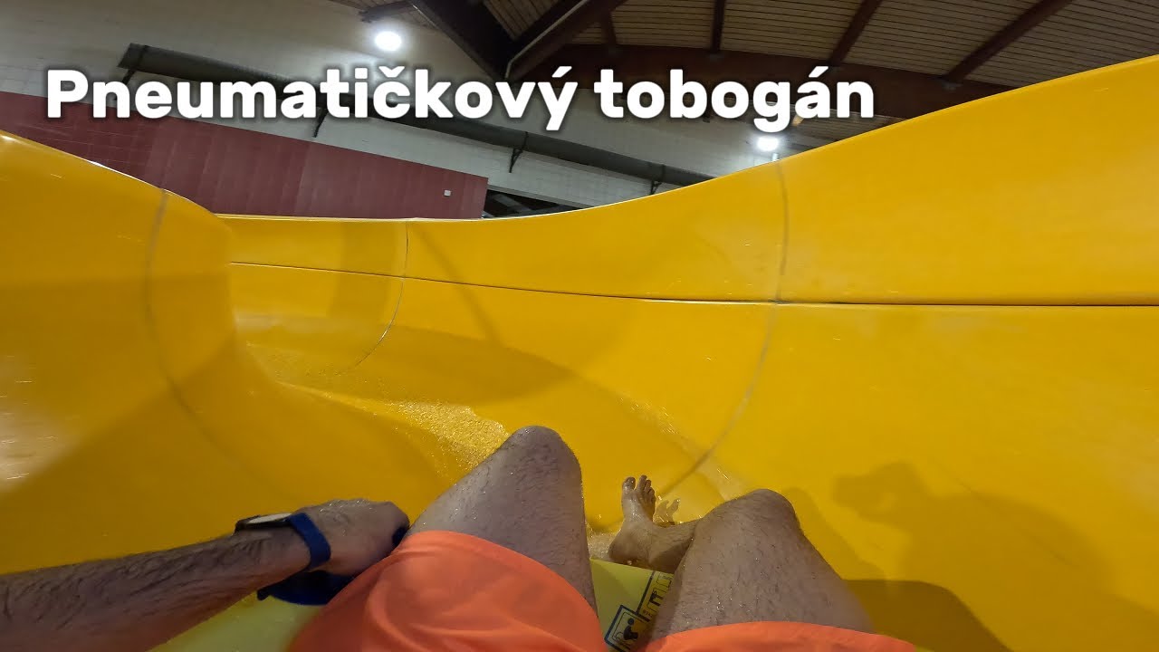 Yellow Tire Water Slide in Water Park Aquapark Beroun Czech Republic, POV 4k