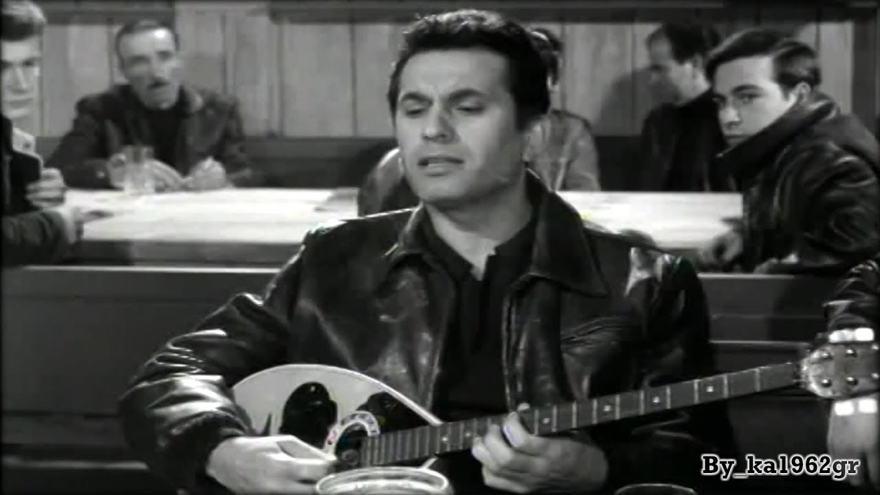 ΝΙΚΟΣ ΞΑΝΘΟΠΟΥΛΟΣ - Χίλιες ξενιτιές δεν κάνουν μια πατρίδα (cine video με νέο ήχο)