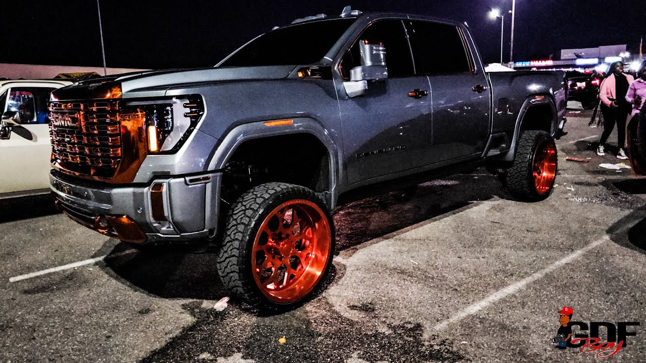 Lifted GMC Sierra Denali on 26