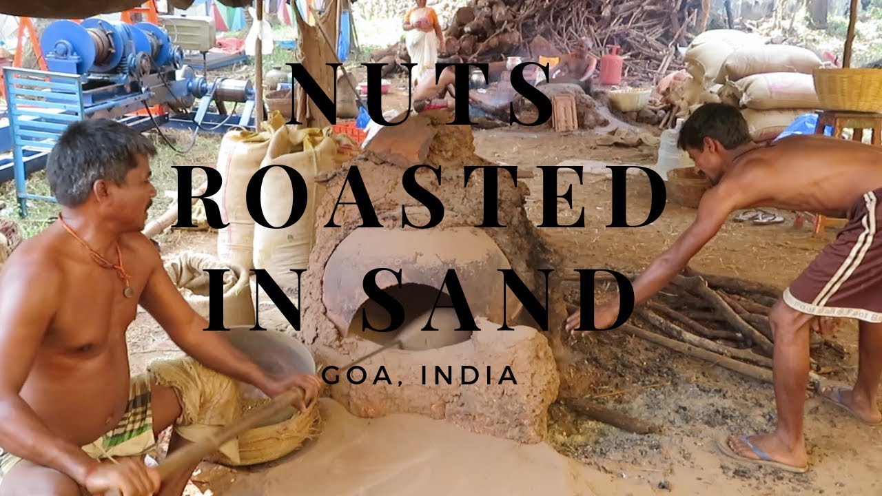 How they roast nuts in hot sand,  Goa, India