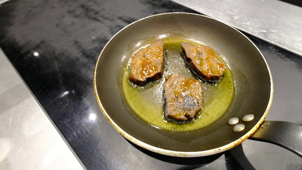Chef Hardiquest prepares a beef stew signature dish at 2 Michelin star restaurant Bon Bon, Brussels