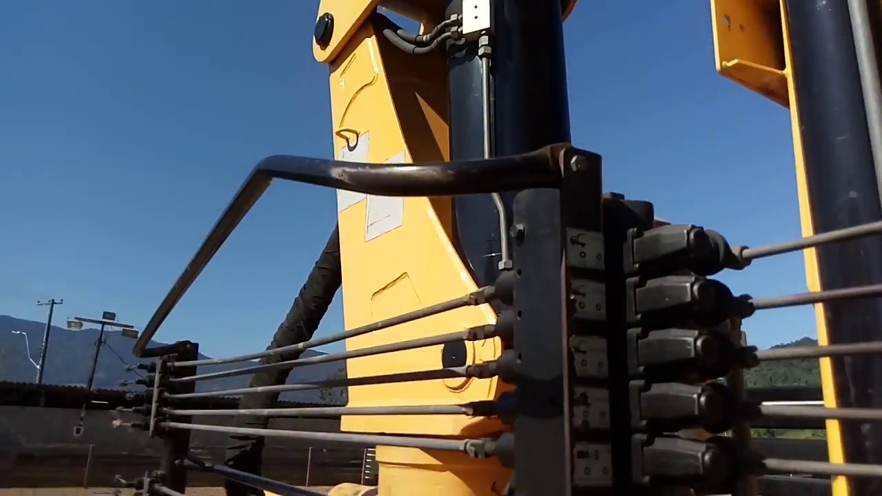 Como operar um guintauto caminhão Munck patolamentos