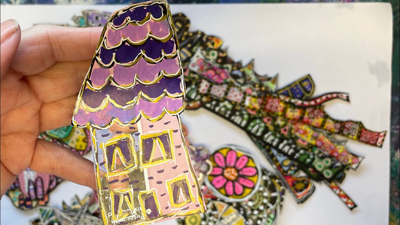 Wonky houses, cats, flowers, borders etc on magazine paper