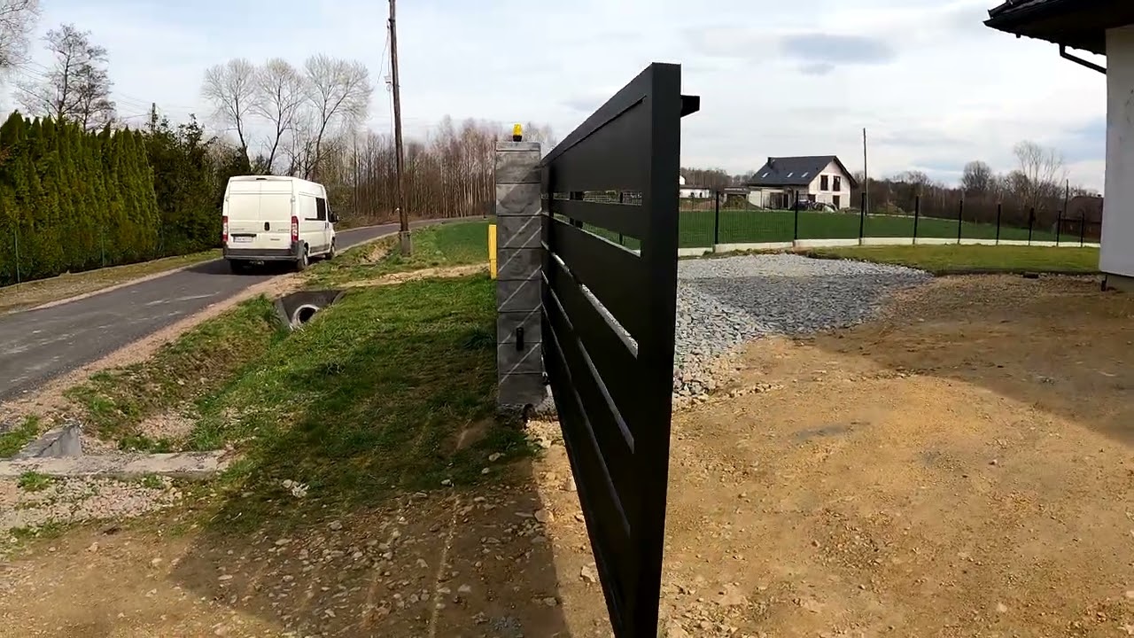 Brama Panelowa przesuwna. Brama 5 metrów światła. Bram-Art Wadowice. Napęd Tousek.