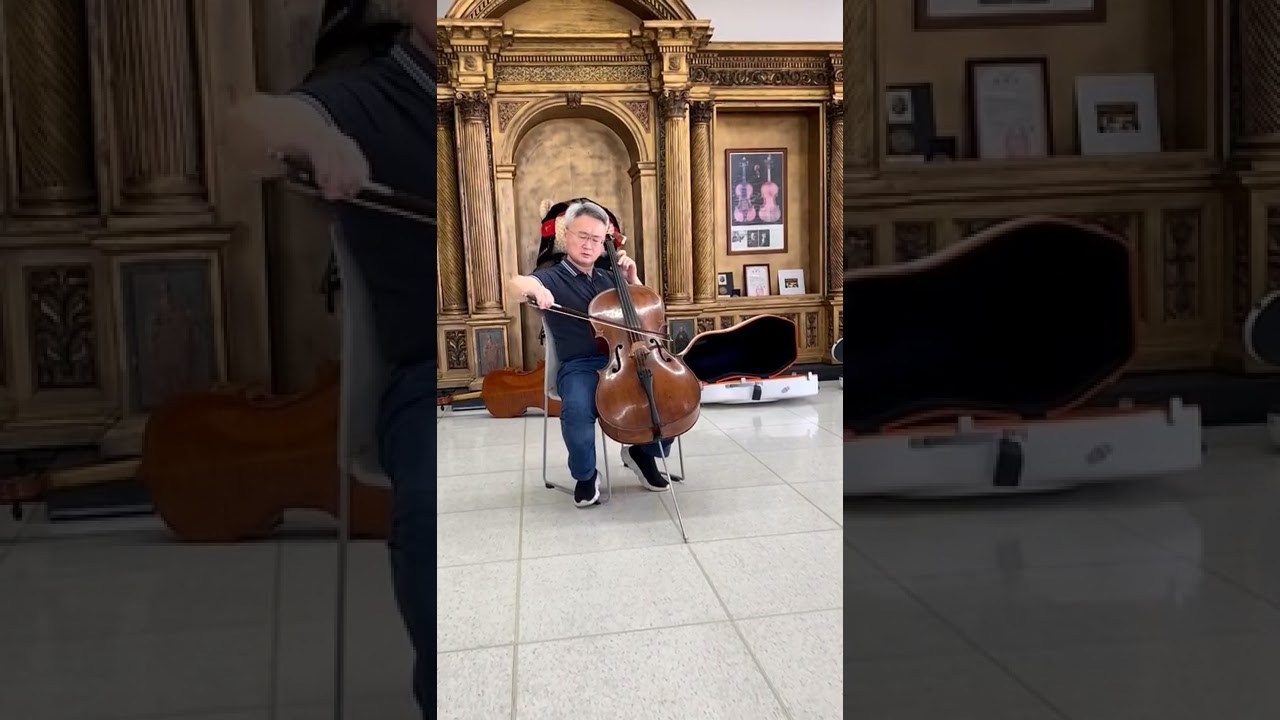 Jian Wang testing, comparing great Cellos. A. Amati