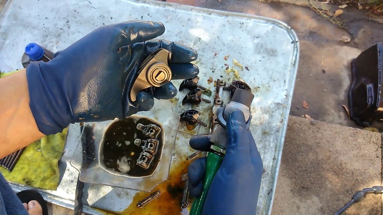 how to clean sludge build up/ parts wash