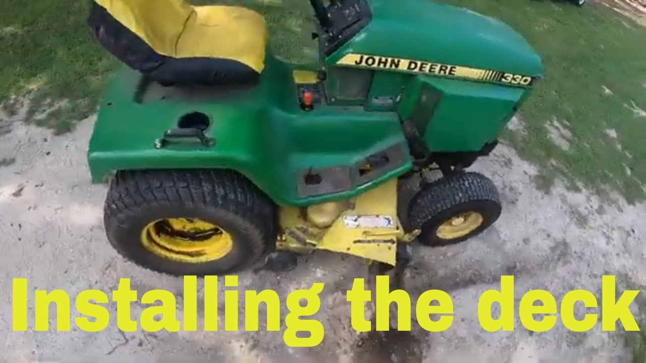 Installing a mower deck on a John Deere 318- how to attach deck 316, 318, 322, 330, or 332 tractor